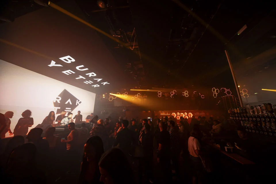 Crowd and stage lighting at Burak Yeter’s Hive Club set