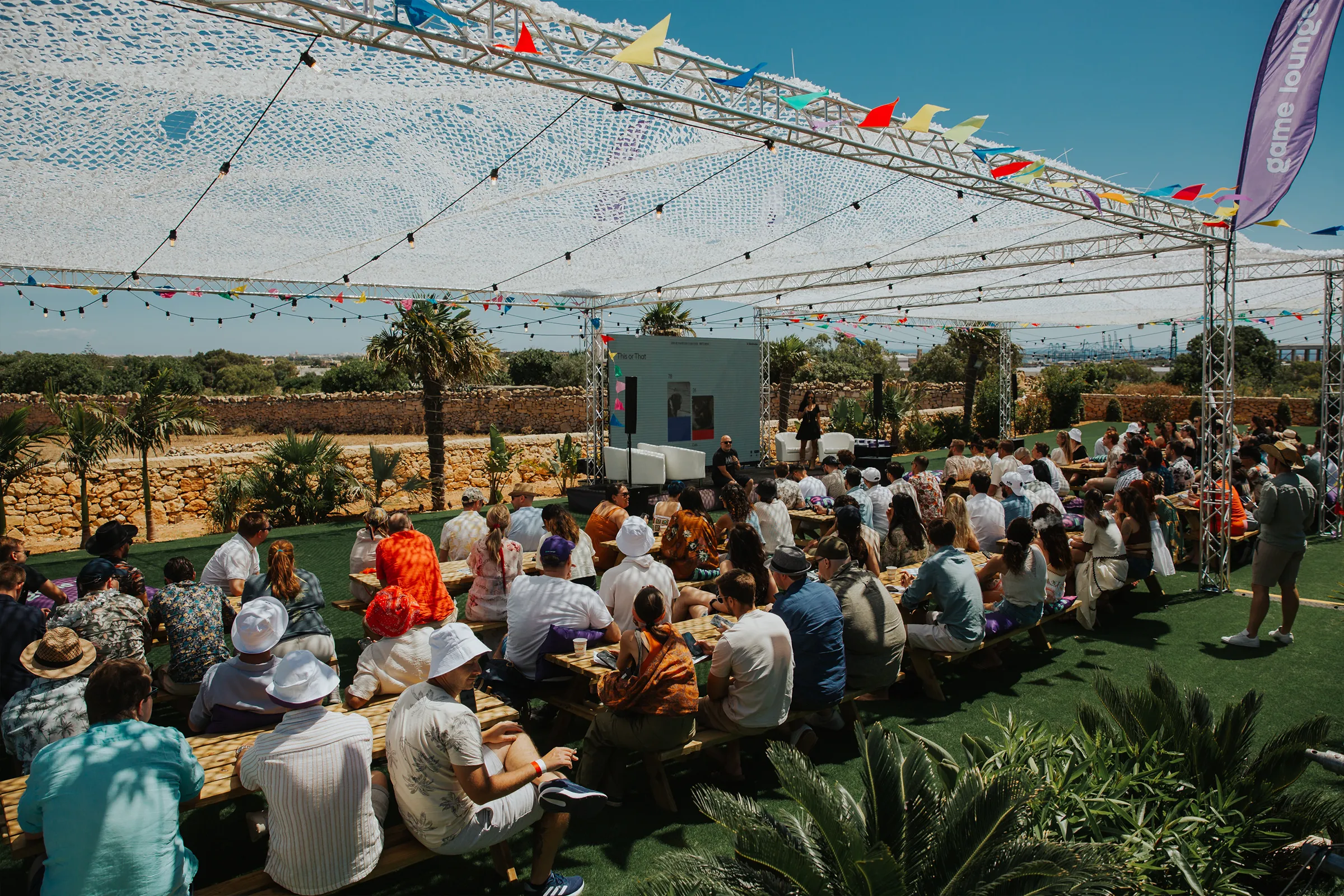 Guests exploring a large illuminated product display at a Thunderkick brand event at Fortizza.