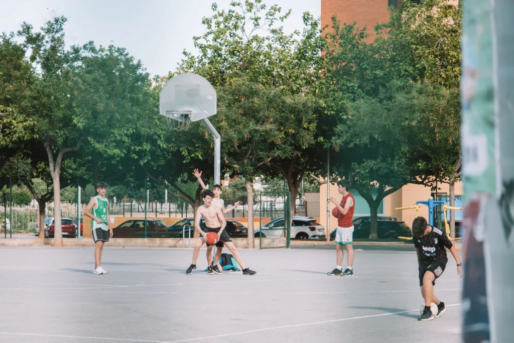 Basketball on a public outdoor court in Valencia, Spain