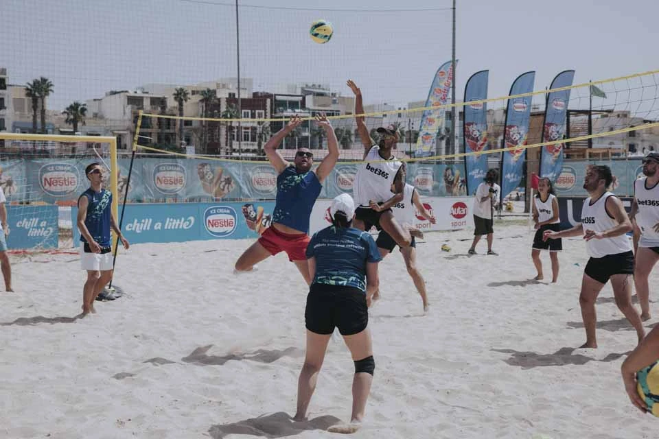 Beach volleyball action at the IFR Beach Games in Pretty Bay, Malta
