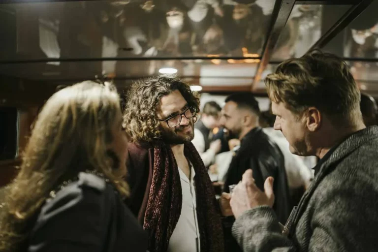 Conversations at the onboard bar · AFLOAT — Exclusive Networking at Sea