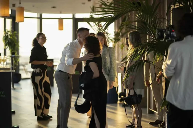 Guests arriving at the rooftop · Above the island